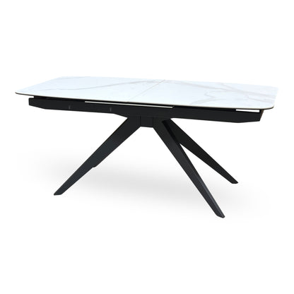 Carrera ceramic top large dining table closed, angled from the right on its black angled legs