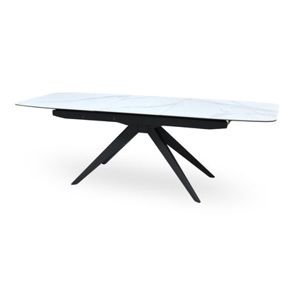 Carrera ceramic top pop up extending dining table extended, angled from the right with the centre leaf in place