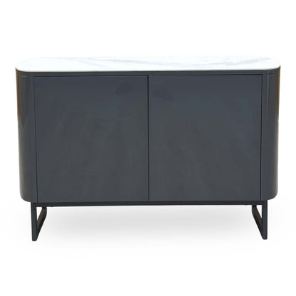 Front view of the Carrera ceramic top 2 door small sideboard on black metal sled legs