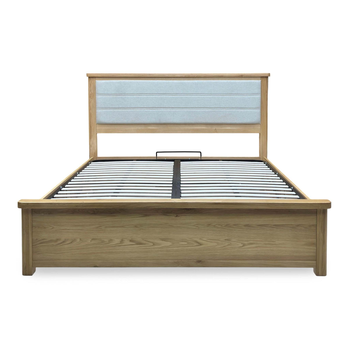 Augusta super king ottoman bed frame with the end lift open to show the oak storage base