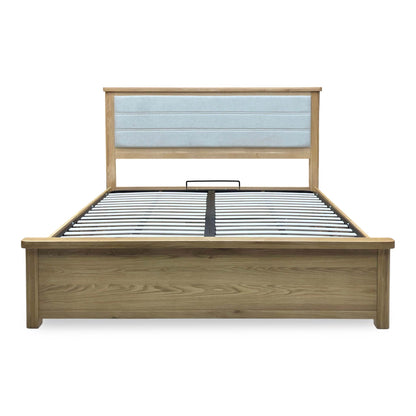 Augusta super king ottoman bed frame with the end lift open to show the oak storage base