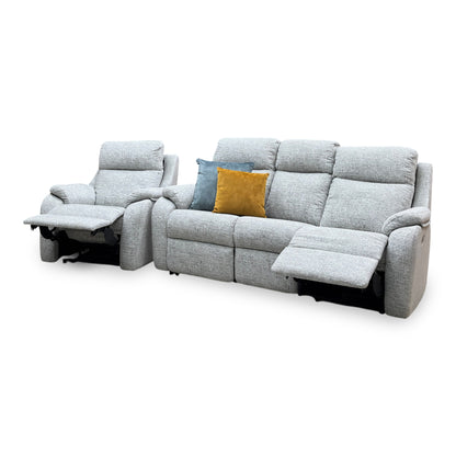 G Plan Kingsbury mist grey fabric chair and 3 seater sofa seen from the right with the footrests raised