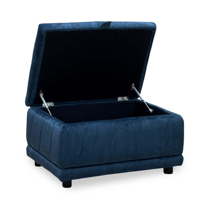 Genius navy blue velvet storage footstool with the lid open and hinge supports visible, angled from the right
