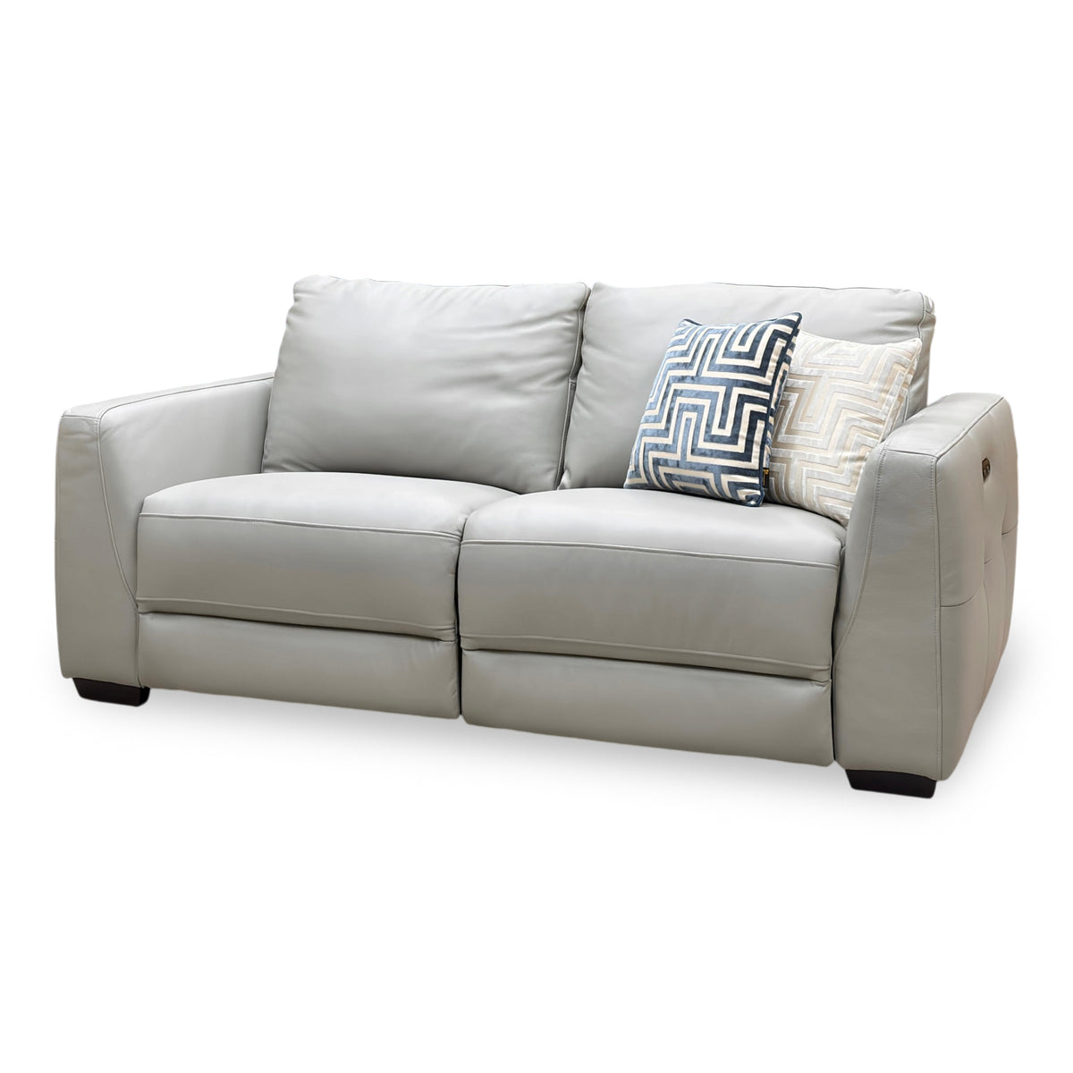 Dinky light grey leather 3 seater power recliner sofa seen from the right, both seats upright