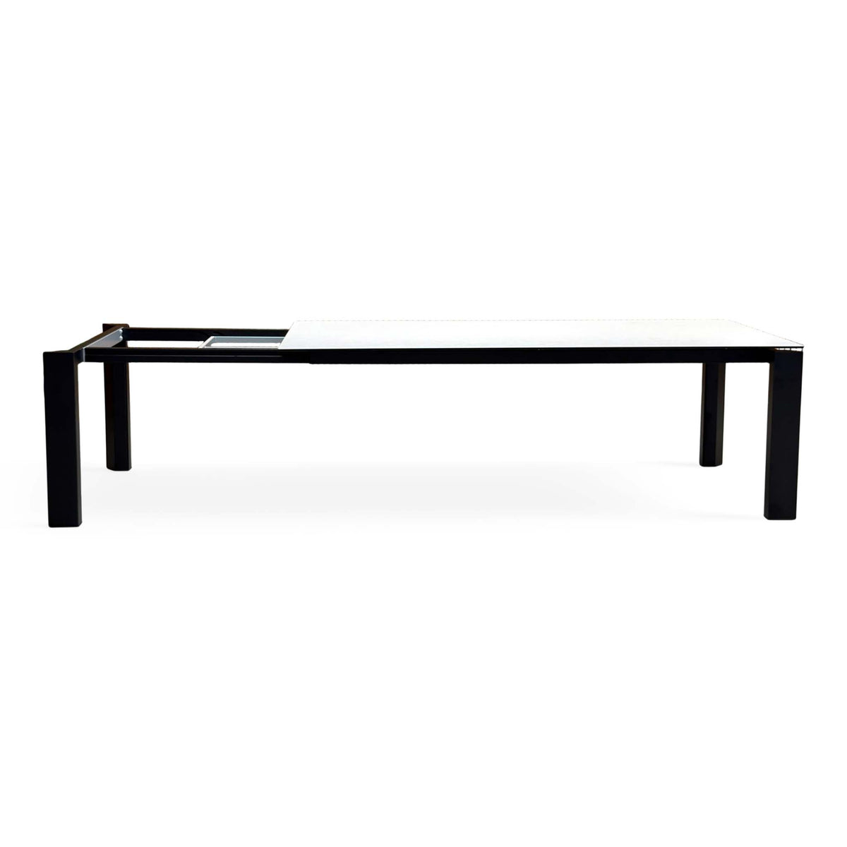 Side-on view of the Connubia Viola light grey ceramic top dining table showing the black metal frame and legs