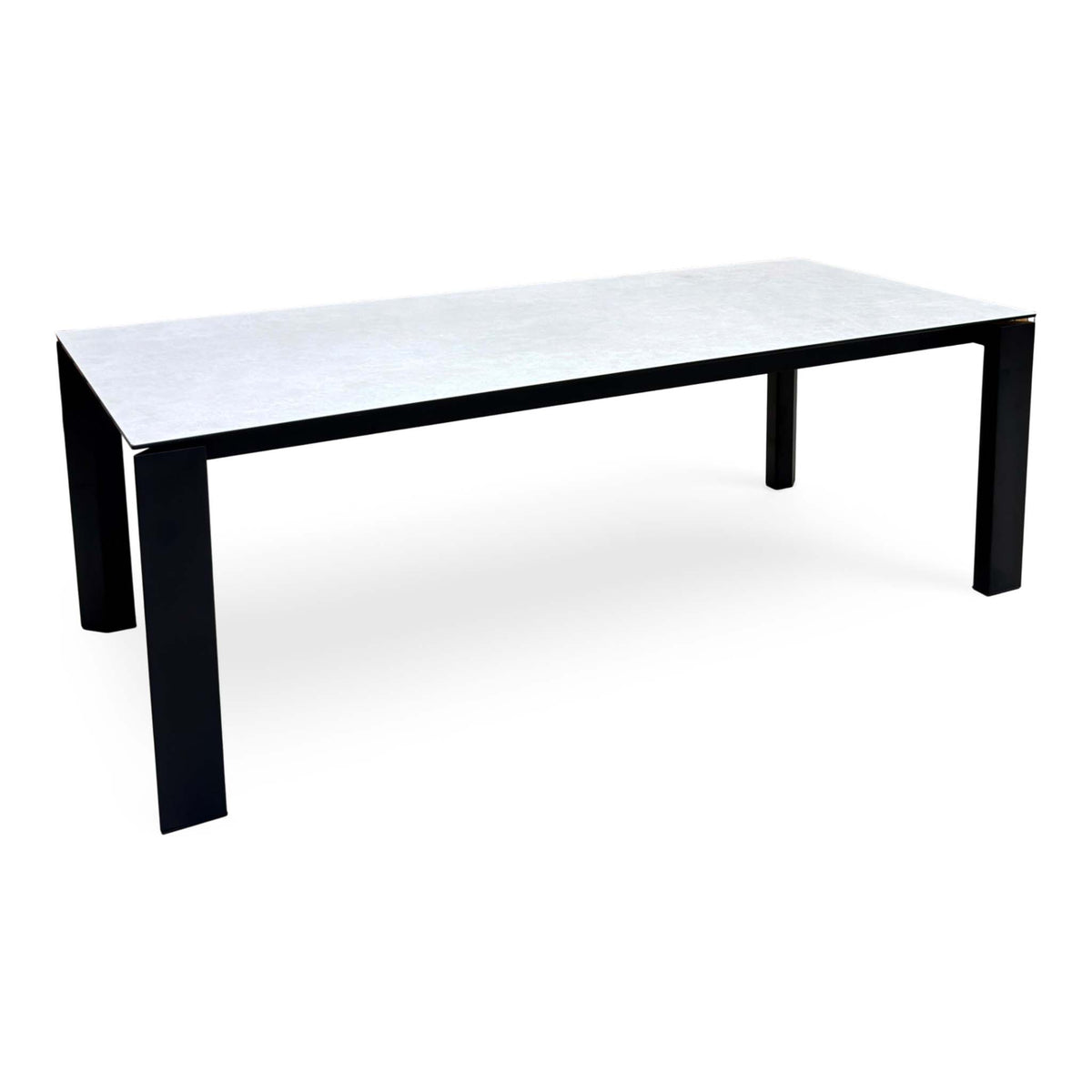 Connubia Viola light grey ceramic top 220cm dining table, angled view with black metal legs