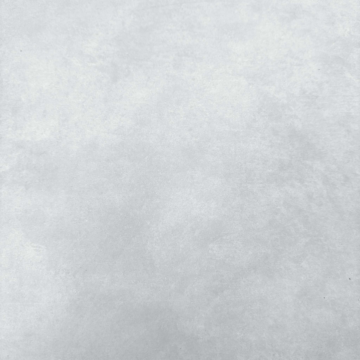 Close-up of the light grey ceramic surface used on the Connubia Viola dining table top