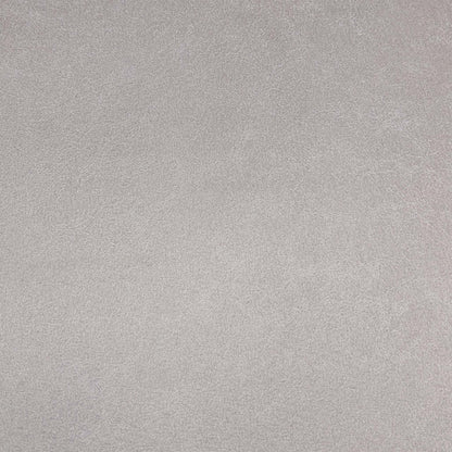 Close-up of the taupe faux leather used on the Vida swivel dining chairs