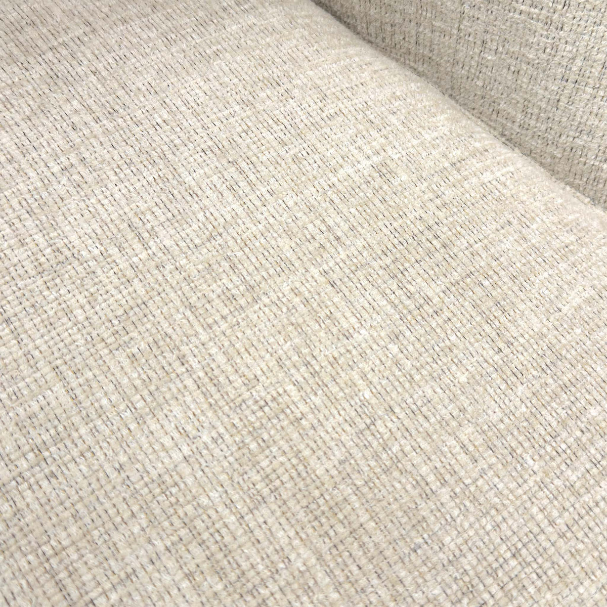 Close-up of the alabaster beige textured fabric used on the Tiber cantilever chairs