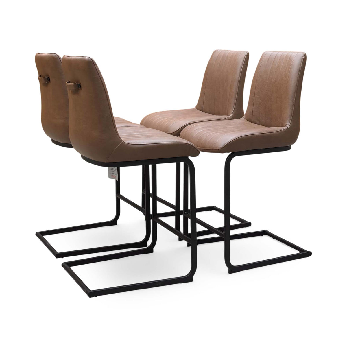 Bodahl Terra cognac brown bar stools angled from behind showing the grab handles on the backs