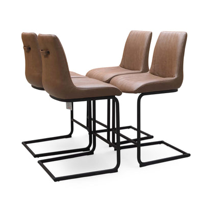 Bodahl Terra cognac brown bar stools angled from behind showing the grab handles on the backs