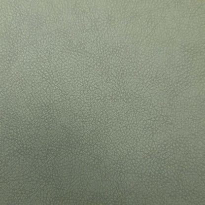 Close-up of the olive green faux leather used on the Riga dining chairs