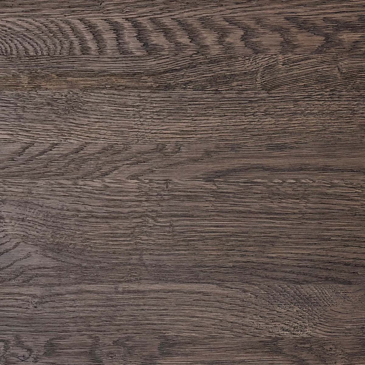 Close-up of the dark oak grain used on the Mars dining table extension leaf