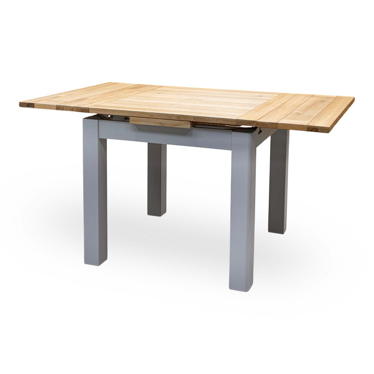 Lewis small draw leaf extending dining table extended, angled view