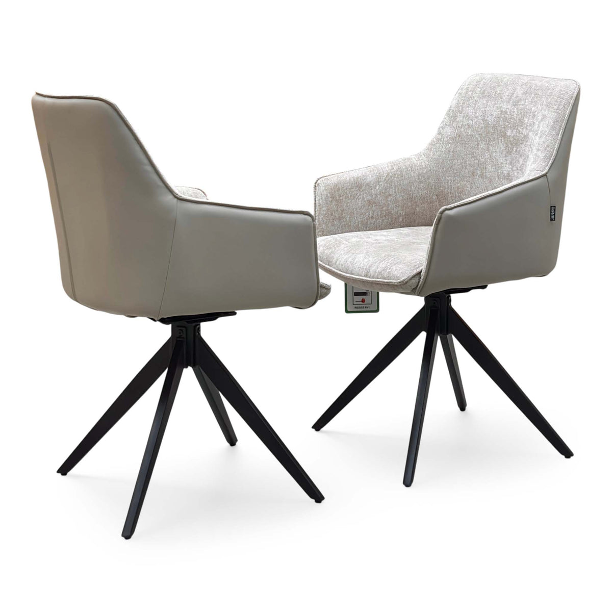 Pair of Jose cream fabric swivel dining chairs, one seen from behind showing the taupe faux leather back
