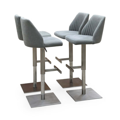 Grigio grey fabric set of 4 swivel bar stools, angled view with fluted backs and square brushed steel bases