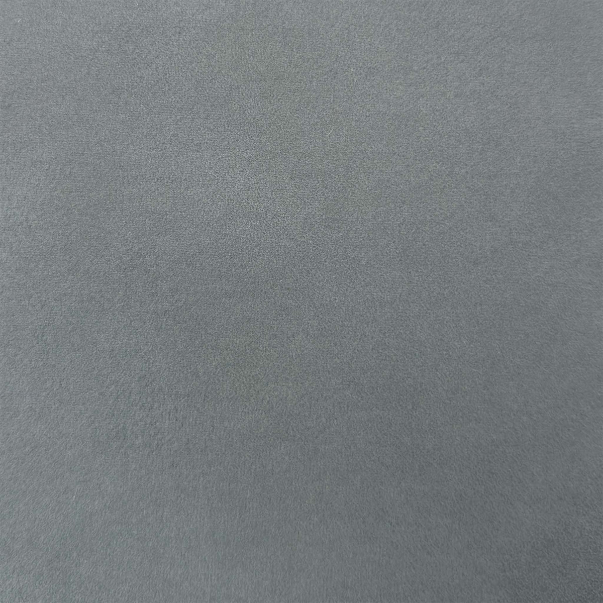 Close-up of the grey velvet-touch fabric used on the Grigio bar stools