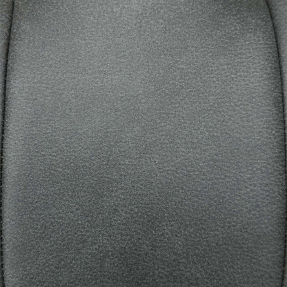 Close-up of the charcoal grey faux leather with contrast stitching used on the Germain dining chairs