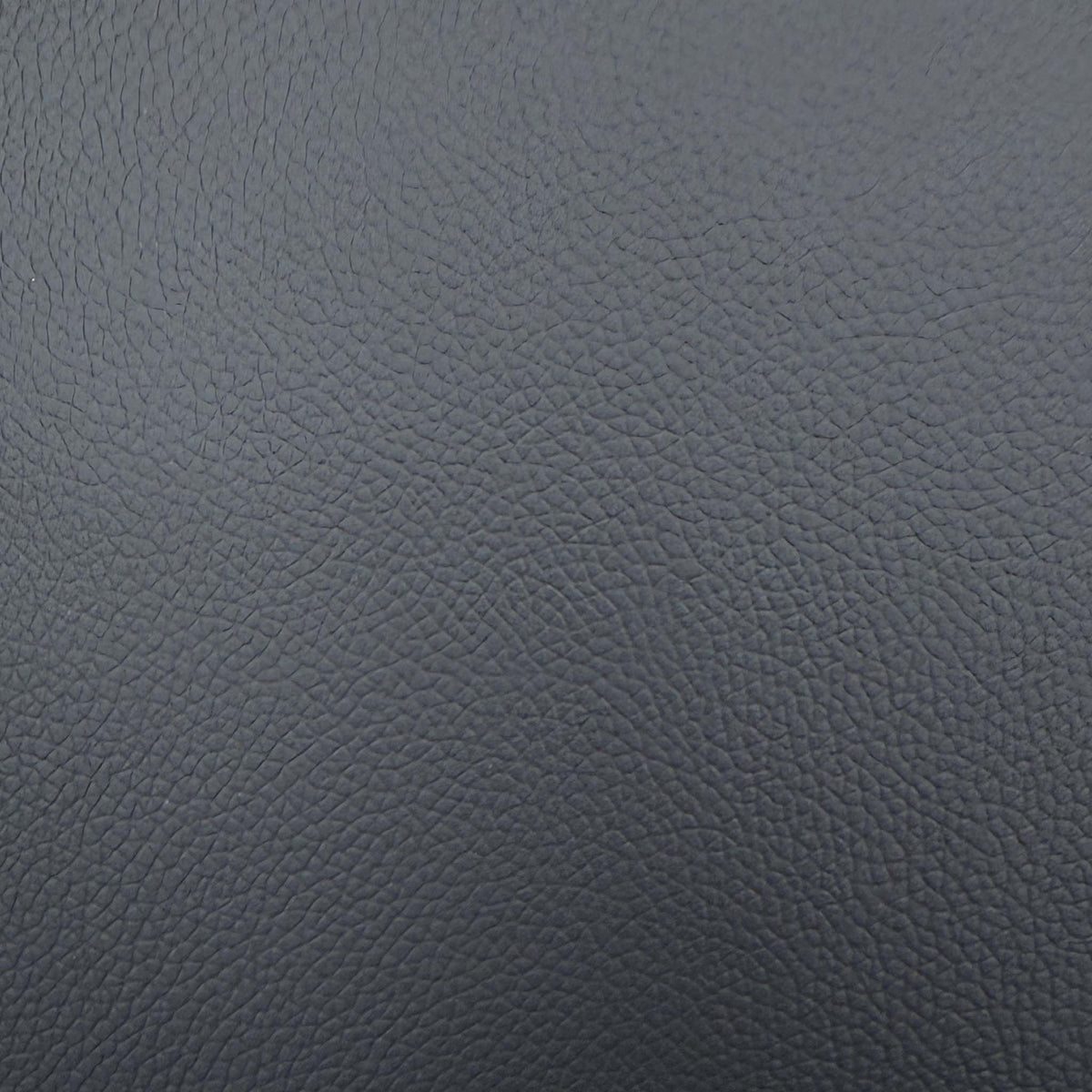 Close-up of the charcoal grey grained leather used on the Pavillion power recliner sofa