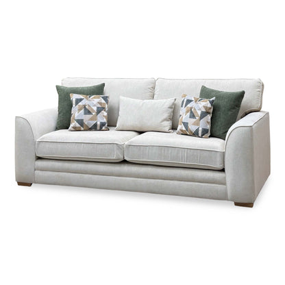 Kaluna natural fabric 3 seater sofa, angled view from the right showing the curved arms and wooden feet