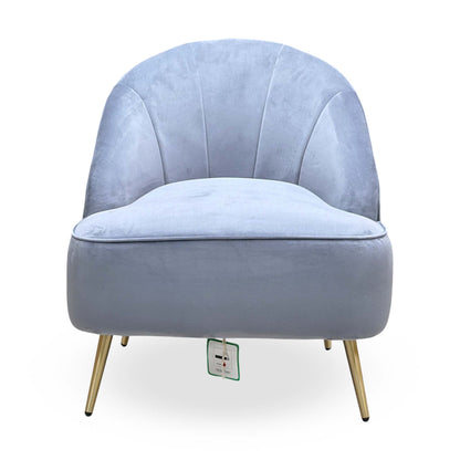 Front view of the Cali bluish grey velvet accent chair showing the fluted back and tapered gold legs