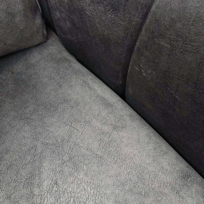 Close-up of the seat and back cushions on the Amara charcoal grey velvet sofa