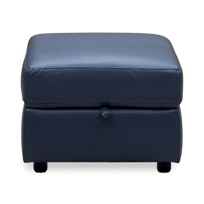 Front view of the World of Leather Touch ocean blue leather storage footstool on dark block feet