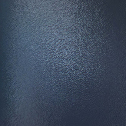 Close-up of the ocean blue grained leather used on the World of Leather Touch storage footstool