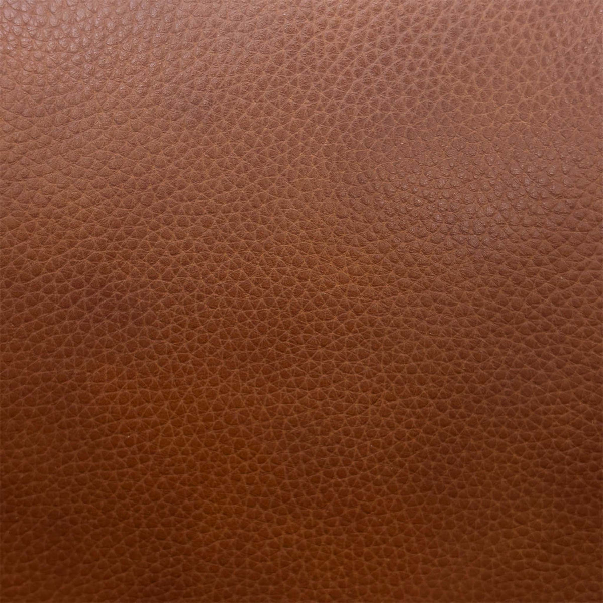 Close-up of the butterscotch brown grained leather used on the Sienna sofa