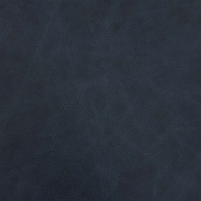 Close-up of the shadow navy blue leather used on the Romilly footstool