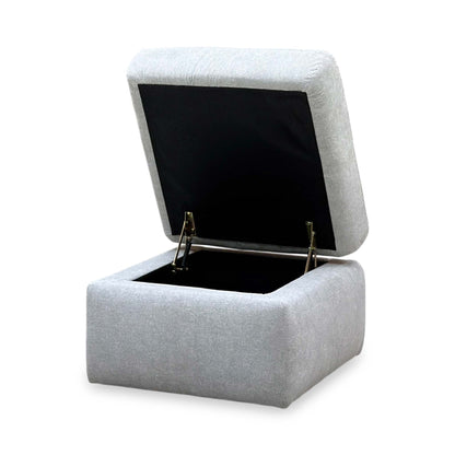 Berlin rosy light grey fabric storage footstool with the lid open showing the black-lined storage compartment