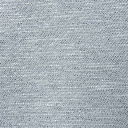 Close-up of the stone grey woven fabric used on the Raul swivel dining chairs