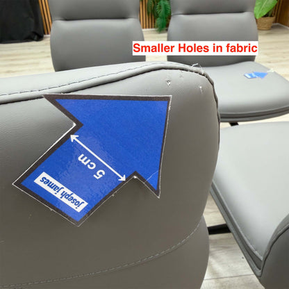 Close-up of the smaller holes in the faux leather on a Quattro stone grey swivel chair back, 5cm arrow for scale
