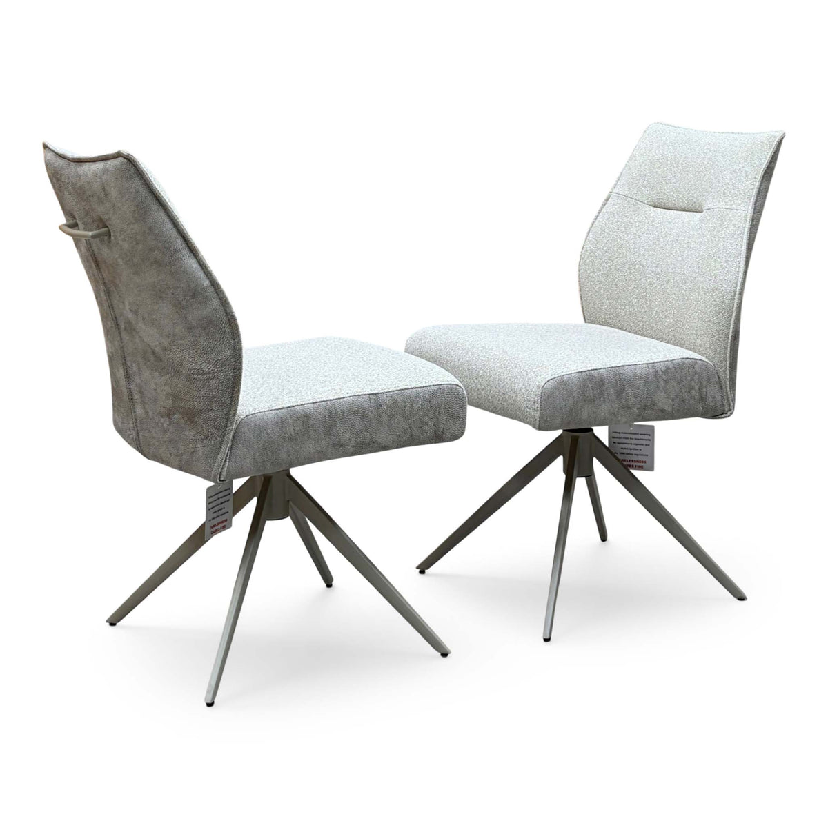 Mirage neutral fabric pair of armless swivel dining chairs, angled view showing the back and front