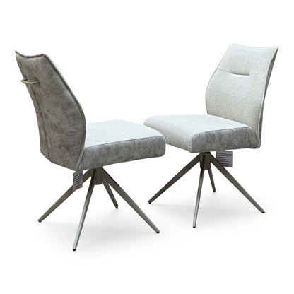 Mirage neutral fabric pair of armless swivel dining chairs, angled view showing the back and front