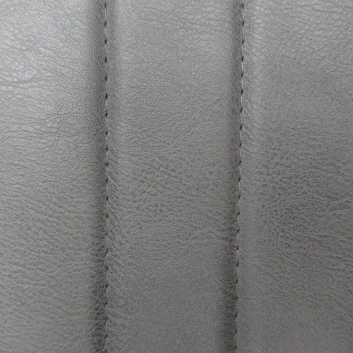 Close-up of the ribbed grey faux leather used on the Terra bar stools