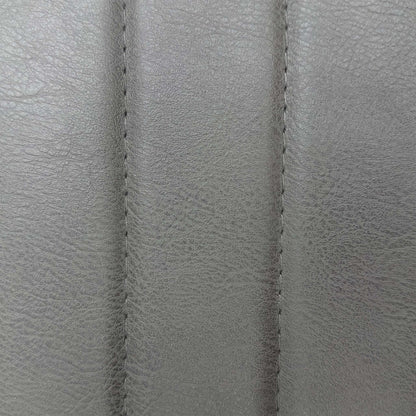 Close-up of the ribbed grey faux leather used on the Terra bar stools