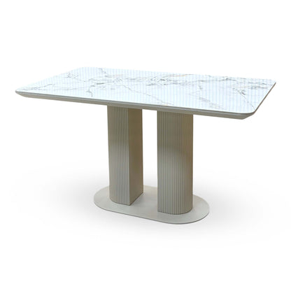 Avorio white marble effect ceramic top fixed dining table, angled from the right