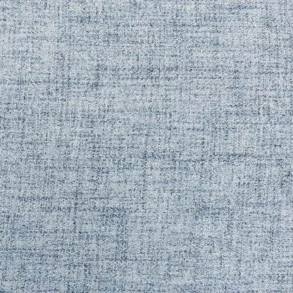 Close-up of the mist grey woven fabric used on the Augusta roll back dining chairs