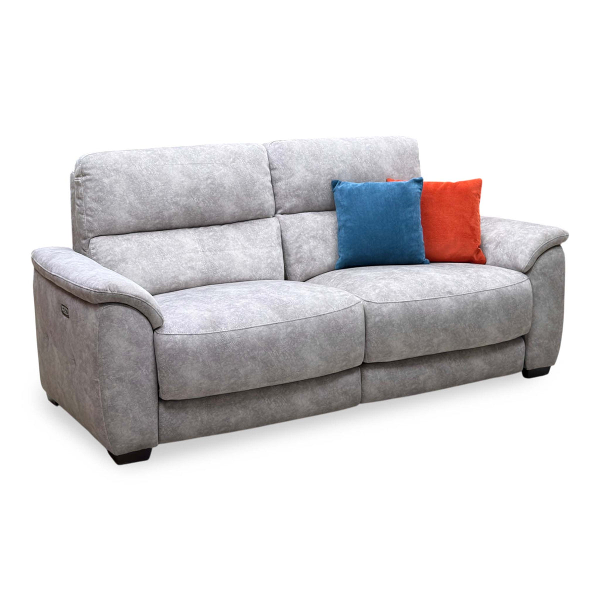 Angled view of the Saffron grey velvet large 3 seater power recliner sofa upright with the left arm nearest