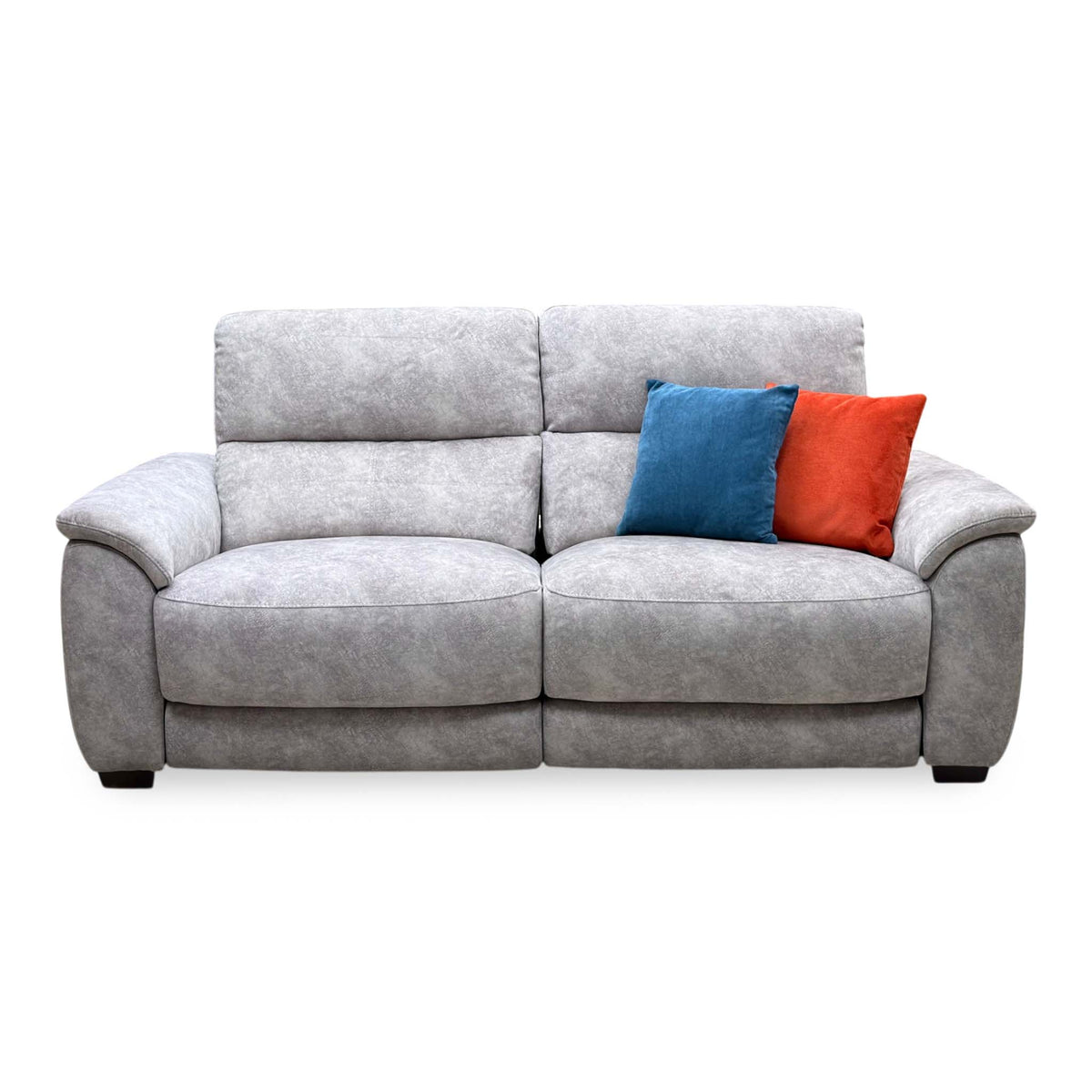 Front view of the Saffron grey velvet large 3 seater power recliner sofa with blue and orange scatter cushions