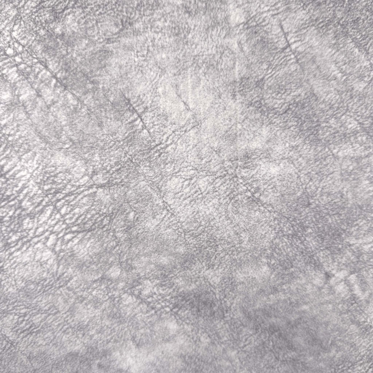 Close-up of the grey distressed velvet fabric used on the Saffron power recliner sofa