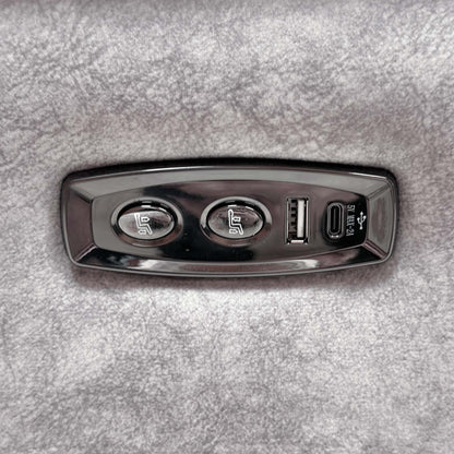 Close-up of the power recline buttons with USB-A and USB-C ports on the Saffron grey velvet sofa arm