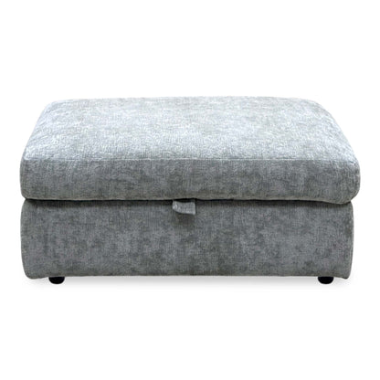 Front view of the Pandora Denby silver fabric large storage footstool with the lid closed