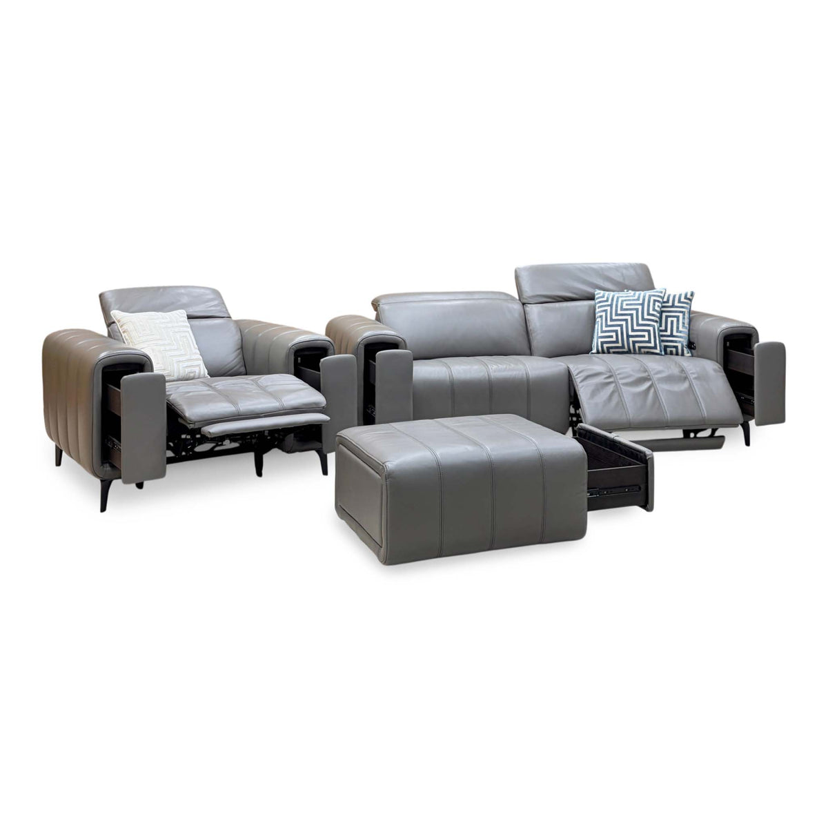 Elphaba elephant grey leather 3 seater sofa and power chair in reclined position with the storage footstool in front