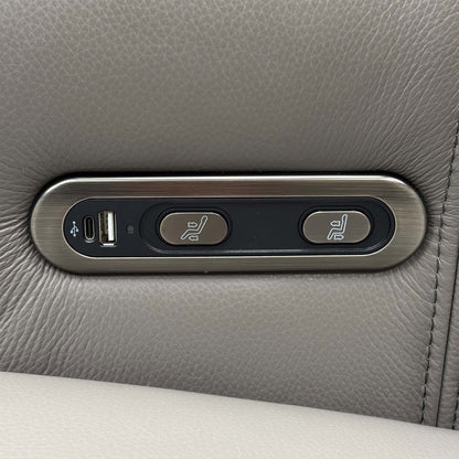 Close-up of the power recline control panel with USB-C and USB-A ports on the Elphaba elephant grey leather sofa