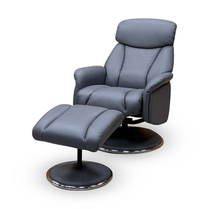 Side angle of the Elm petrol blue leather swivel recliner chair showing the padded arm and footstool