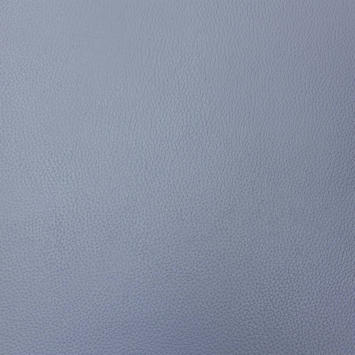 Close-up of the petrol blue grained leather used on the Elm swivel recliner chair