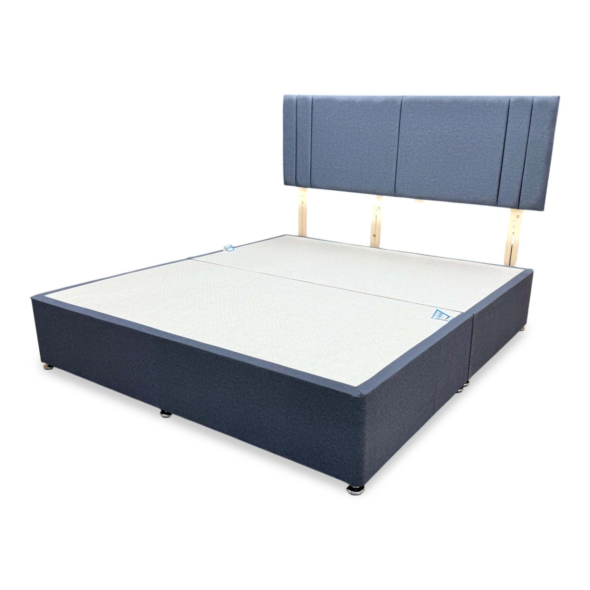 Nelson Sierra denim blue super king divan base and strutted headboard angled from the left