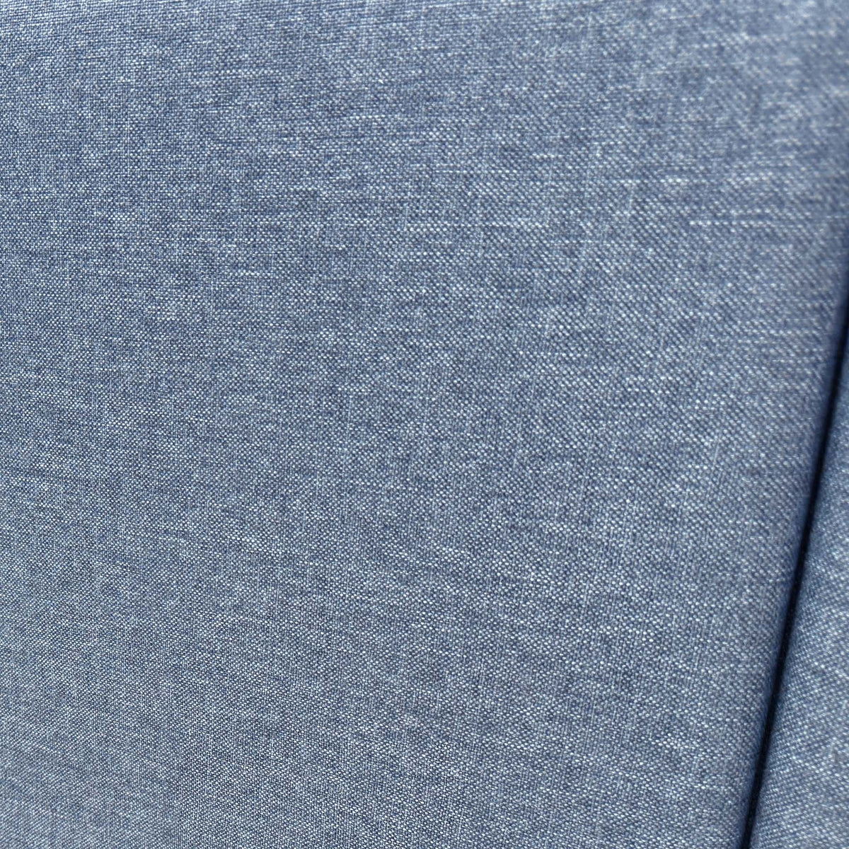 Close-up of the Sierra denim blue fabric used on the Nelson headboard and divan base